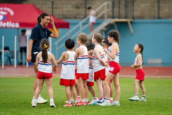 An ESLAC age group together at ES Marks Athletics Field
